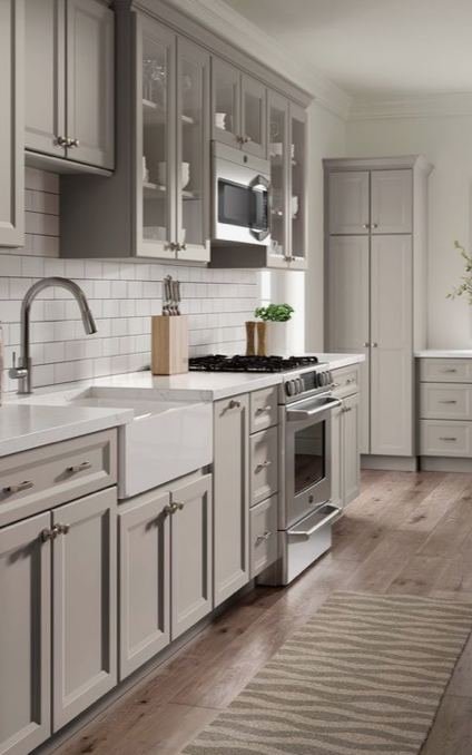 Gray-cabinet kitchen with farmhouse sink